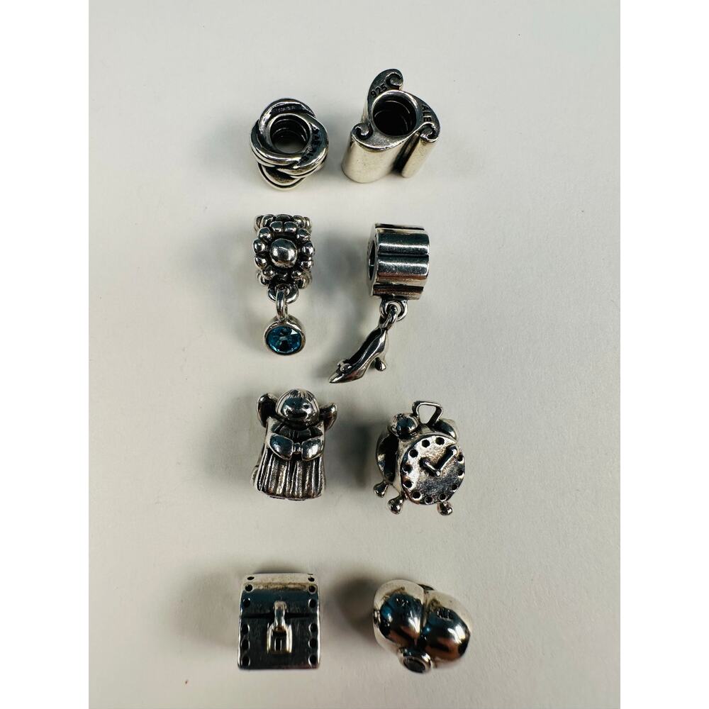 Pandora Bundle of Eight Sterling Silver Charms Spacer Beads Angel Clock Chest